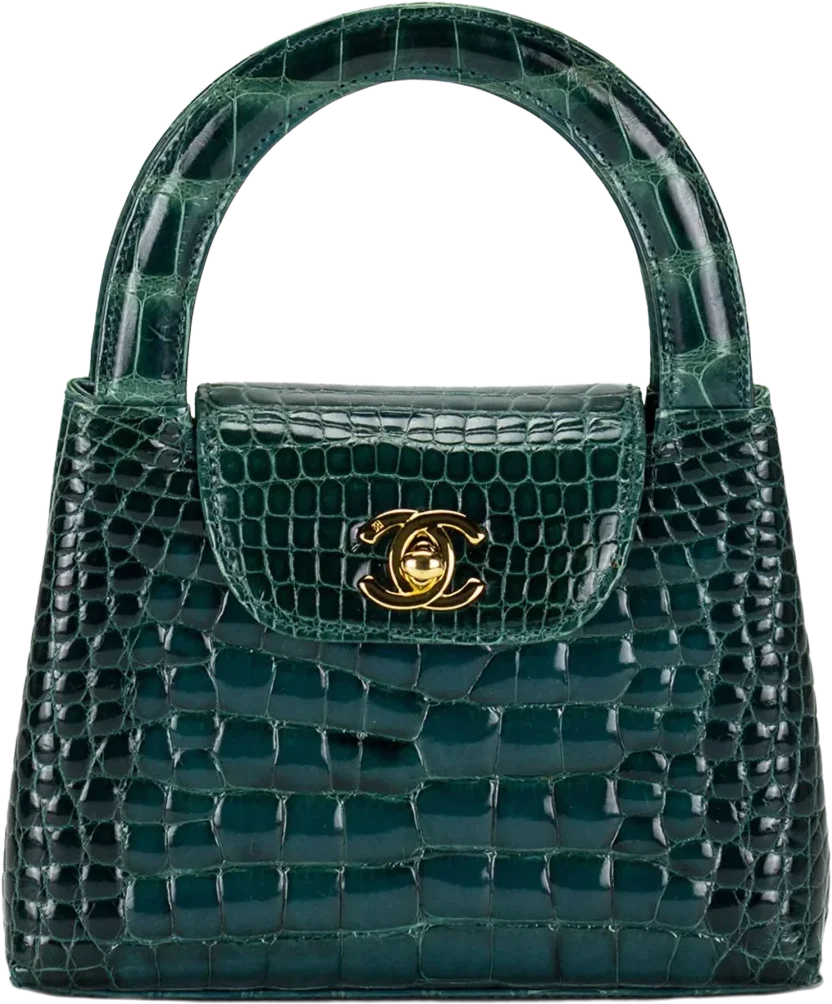 A small vintage top-handle bag in deep green alligator.